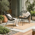 Black rattan 3 piece bistro set styled on a patio