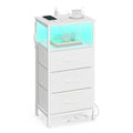 White 3-tier bedside table with 3 fabric drawers and a lit open shelf