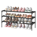 Wide 3-tier shoe rack in black holding 4 pairs of shoes on each shelf