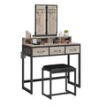 Dressing table with mirror, drawers, and stool on a white background