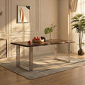 Natural acacia wood dining table with silver looped steel base set for a meal in a dining room