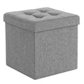 Light grey linen look ottoman cube with the lid in place on a plain background