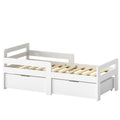 White kids bed frame with 2 storage drawers and guard rails on a plain background