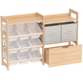 Kids toy storage unit with 9 white bins, 2 fabric drawers and a rolling wooden drawer on a white background