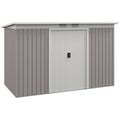 Light grey 9x4ft metal garden shed with double sliding doors closed, studio view