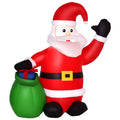 Red 4ft inflatable Santa waving with a green gift sack beside him, white studio shot