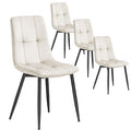 Set of four cappuccino beige velvet dining chairs with black steel legs on a white background