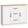 White sideboard with a wood-effect top, three centre drawers and two doors with black handles on a plain background