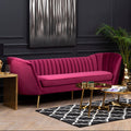Wine velvet 3 seater sofa with gold legs styled in a living room