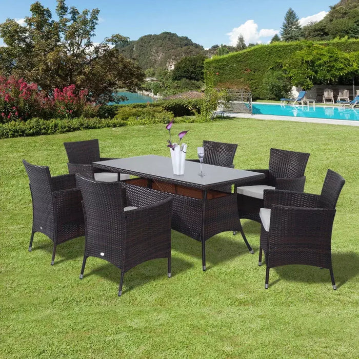 Image of brown rattan 6 seater patio table and chairs dining set with cream cushions