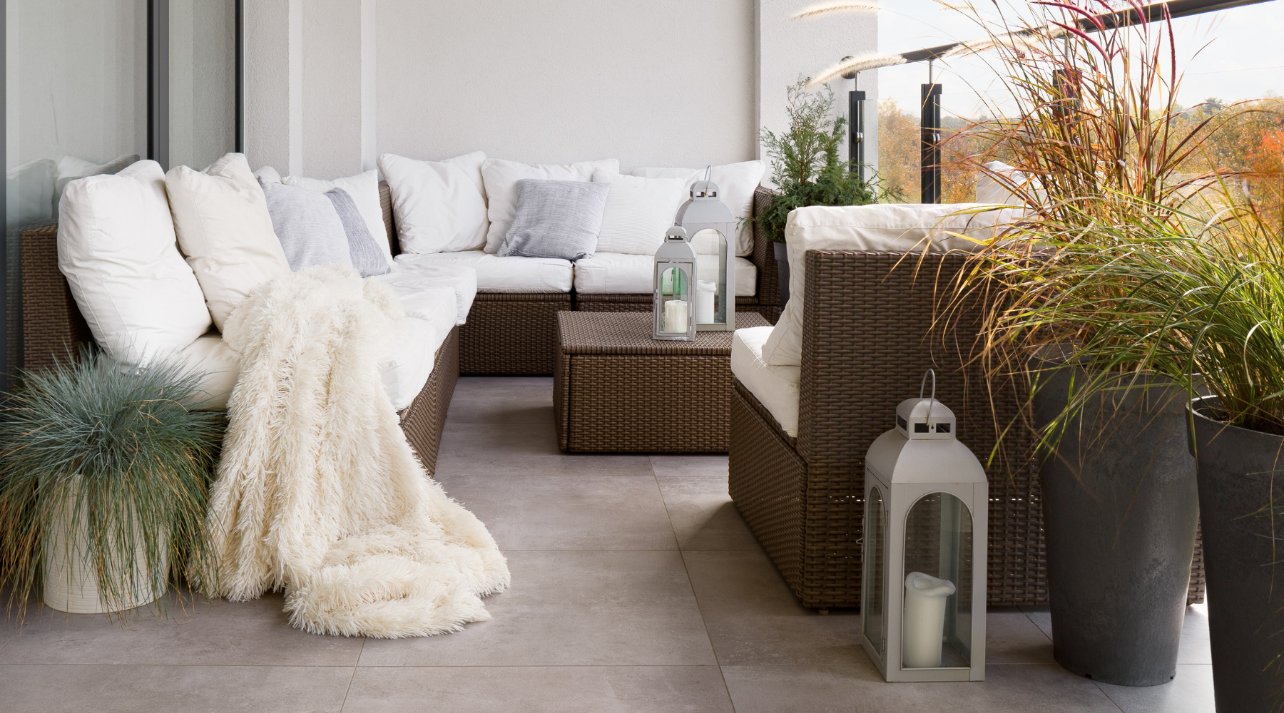 A serene garden scene with wicker rattan garden furniture Cushions and Accessories 