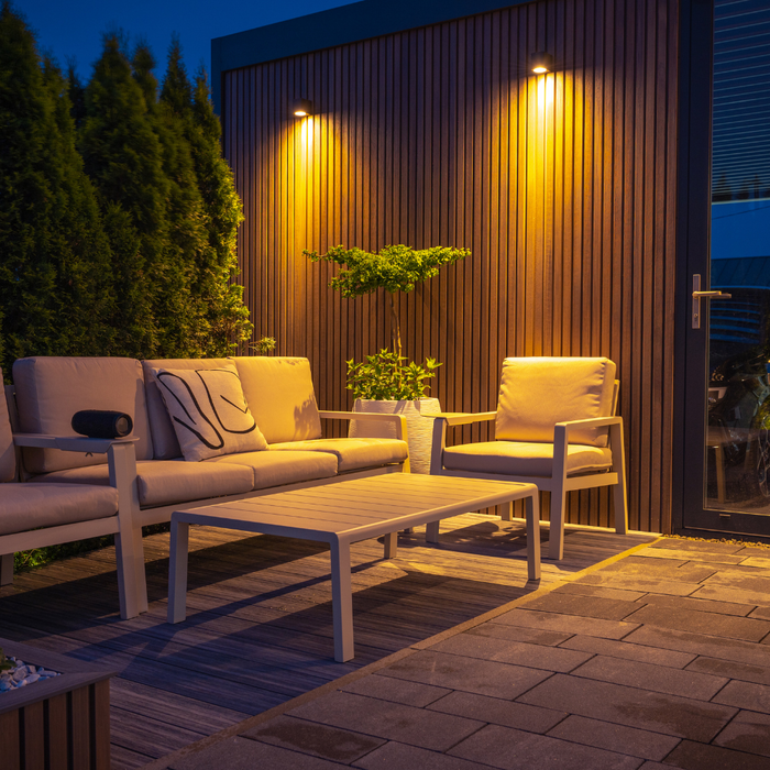 Cosy Scene Featuring a Small Patio With Space Saving Patio Furniture