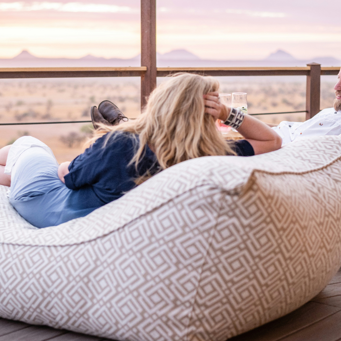 A couple enjoying a moment together on the deck