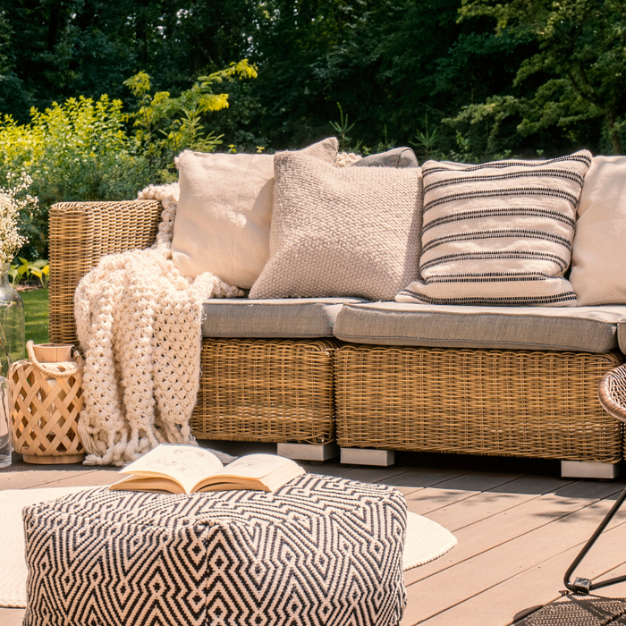 Rattan Garden Furniture Set on a Deck With a Swing Chair