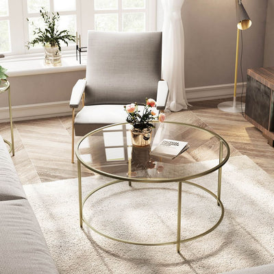 Image of a vasagle round coffee table with a glass top and gold frame