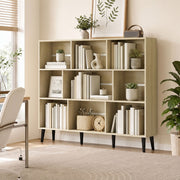 Oak 10-cube bookcase styled with books and plants in a home office