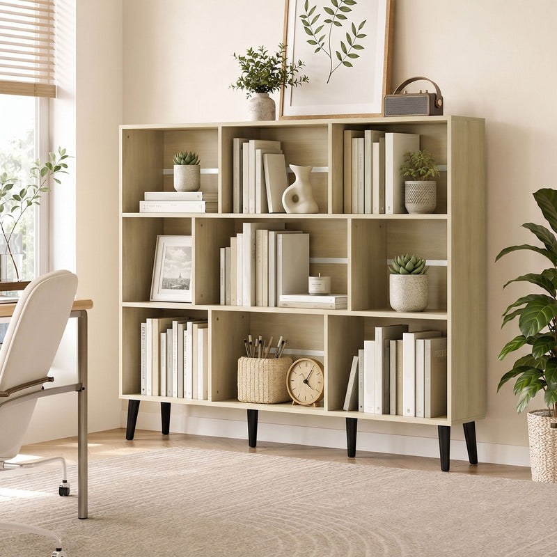 Oak 10-cube bookcase styled with books and plants in a home office