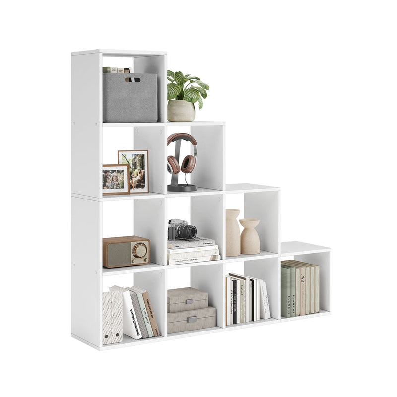White 10-cube stepped storage bookcase styled with books and decor, studio shot