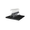 Set of 10 black Songmics clamp bar skirt hangers stacked on a white background