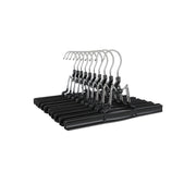 Angled view of the stack of 10 black skirt hangers showing the chrome hooks