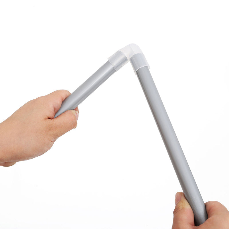Hands pushing a metal pole into a plastic joint connector by hand