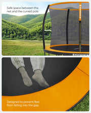 Child jumping on the trampoline inside the safety net enclosure in a garden setting