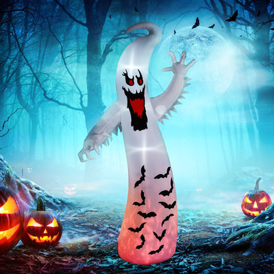 Scary waving ghost inflatable shown against a plain background
