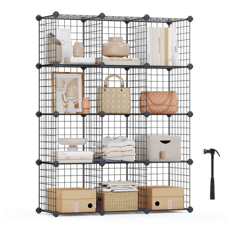Black 12 cube wire mesh storage organiser built 3 wide by 4 high, styled with books, bags and boxes, with the rubber mallet beside it