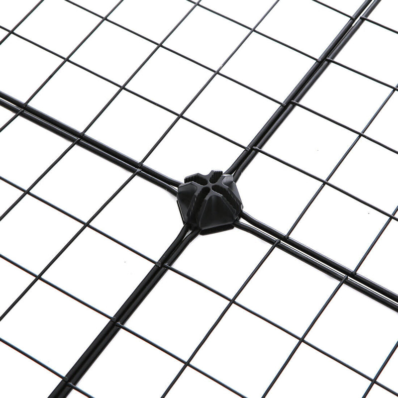 Close-up of a black plastic corner connector joining four wire mesh panels