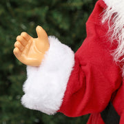 Close-up of Santa's waving hand and white cuff