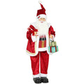 Studio shot of the red velvet singing Santa Claus figure