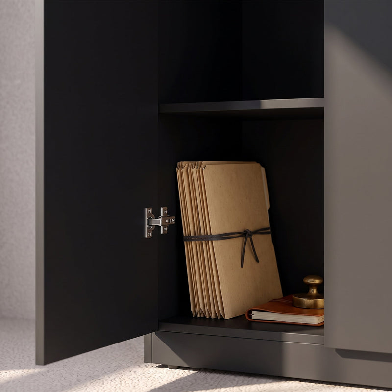 Close-up of the cabinet's interior hinge with folders and a clock stored inside