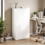White storage cabinet styled in a home office beside a desk and chair