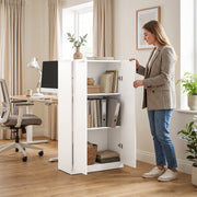 Woman opening the cabinet door in a home office next to a standing desk