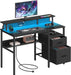 Image of a black Vasagle 120cm gaming desk with drawers and LED lights