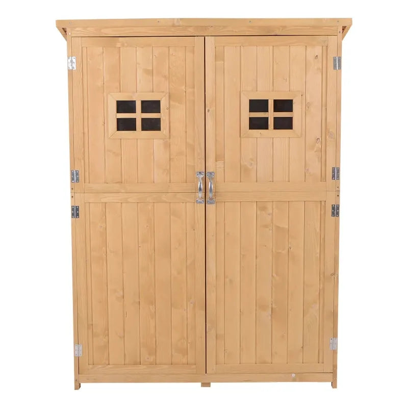 Front view of the natural shed showing the two doors and their window openings