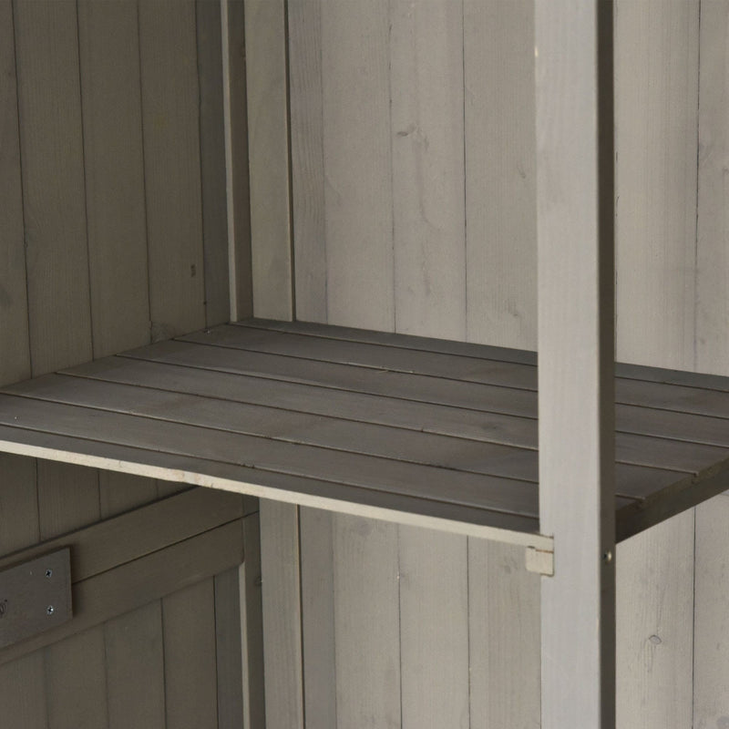 Close-up of a slatted shelf and the centre post inside the grey shed