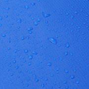 Close-up of the safety pad's water-resistant blue fabric with water droplets beaded on the surface