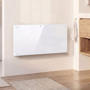 White panel heater wall-mounted in a bathroom hallway near a towel hook