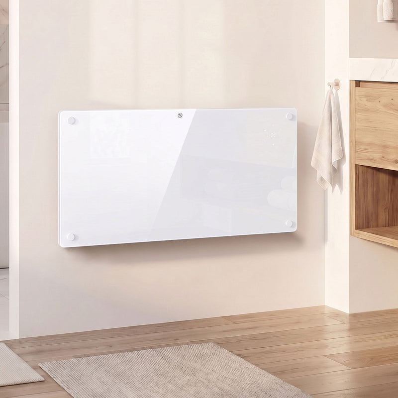 White panel heater wall-mounted in a bathroom hallway near a towel hook
