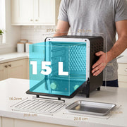 Mini oven held on a worktop with 15L capacity graphic and rack and tray sizes marked