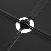 Close-up of the black plastic corner connector joining four cube panels together