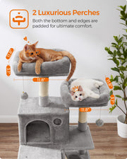 Cat scratching a sisal-wrapped post on the light grey cat tree