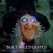 Close-up of the witch's face showing glowing purple LED eyes and built-in sound feature