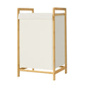 Cream white 2-compartment laundry sorter on a natural bamboo frame