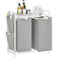 Angled studio shot of the white and light grey 2 compartment laundry sorter with top shelf