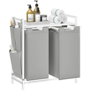 Angled studio shot of the white and light grey 2 compartment laundry sorter with top shelf
