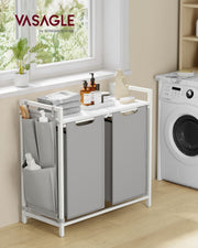 Laundry sorter beside a washing machine in a bright utility room