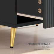 Close-up of the tapered metal leg, foot pad and under-mounted drawer slides