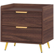 Studio three-quarter view of the bedside table with gold handles and tapered legs
